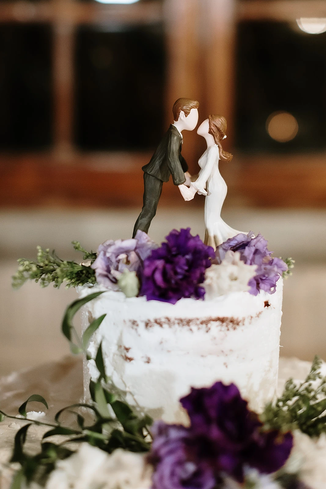 Cake topper della torta di matrimonio di Phil e Gloria 